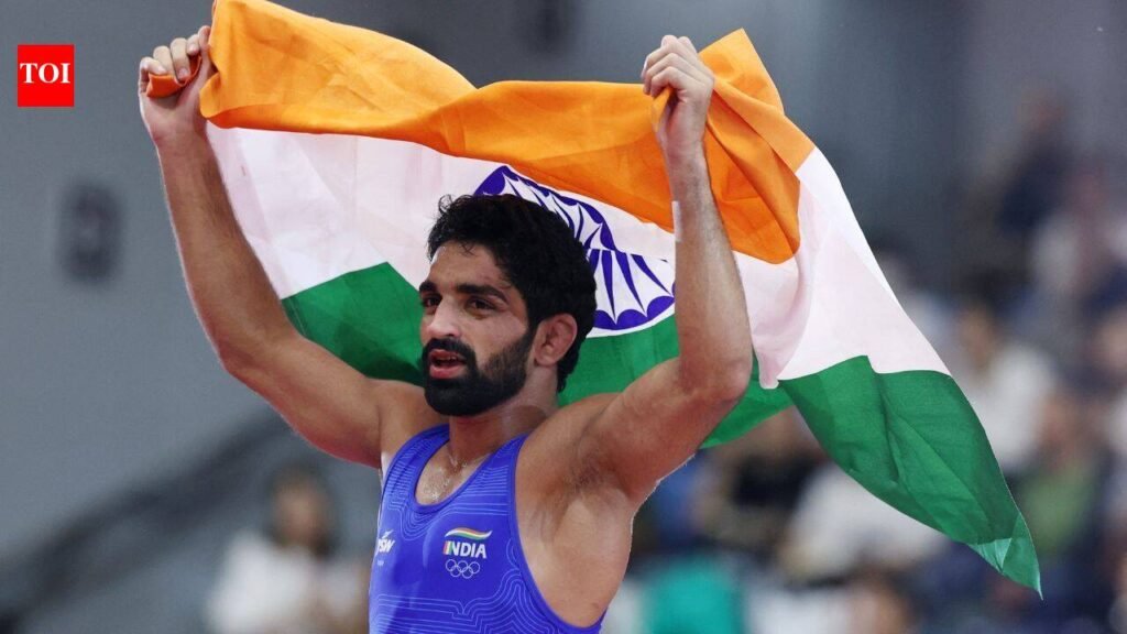 Aman Sehrawat fights back from 6-7 down to beat World Champion for Asian Games wrestling gold | Asian Games 2026 News
