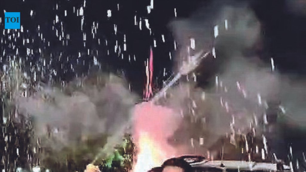 Ahmedabad man bursts firecrackers at Sabarmati Riverfront, sports ‘Police’ board on car for birthday; lands in legal trouble | Ahmedabad News