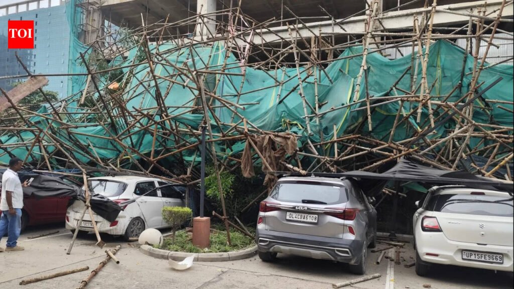 Shuttering collapses from 7th floor of construction site amid strong winds; 14 cars crushed in Noida | Noida News