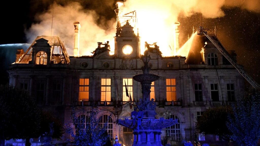 France arrests man, calls in anti-terror police over town hall protest fire