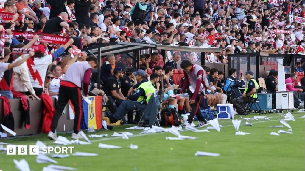 La Liga match abandoned as Rayo Vallecano fans throw paper planes onto pitch